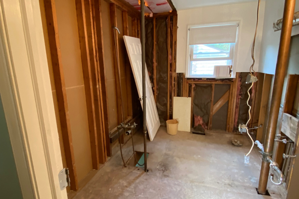 Bathroom with walls ripped out