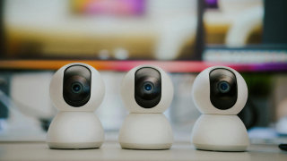 Indoor security camera monitoring home interior spaces