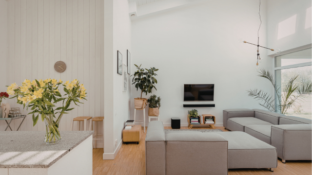 Modern apartment interior with sleek furniture and open kitchen layout